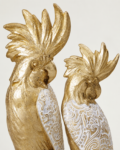 Figura de loro decorativo blanco y dorado